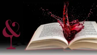 Offenes Buch mit spritzender roter Flüssigkeit auf den Seiten vor schwarzem Hintergrund - DART